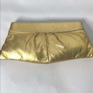 Lauren Merkin gold clutch